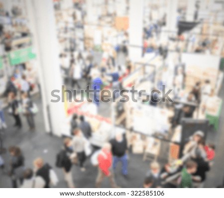 People crowd, panoramic generic background. Intentionally blurred post production.