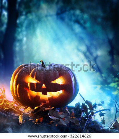Halloween Pumpkin In A Spooky Forest At Night - Scary Scene
