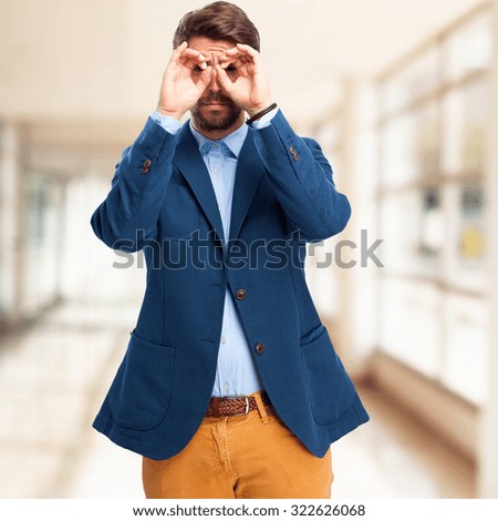 happy businessman binoculars sign