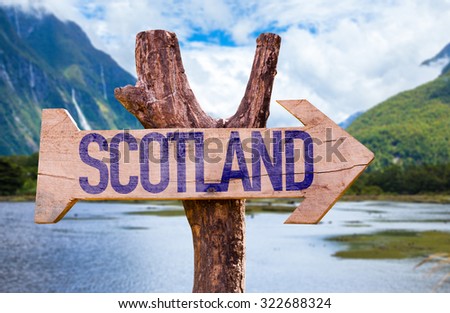 Scotland wooden sign with landscape background