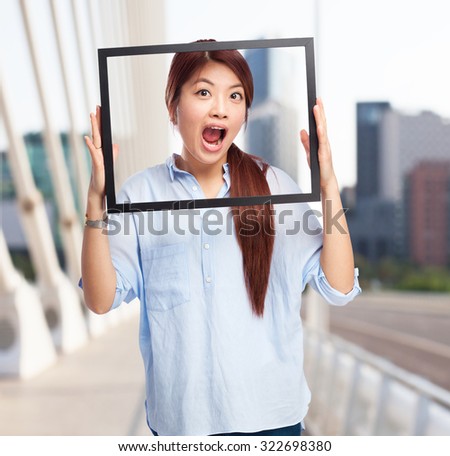 happy chinese woman with black frame