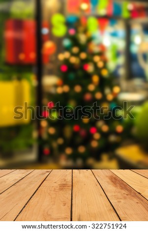 Empty perspective room with sparkling bokeh wall and wooden plank floor  for display of your product for Christmas background.