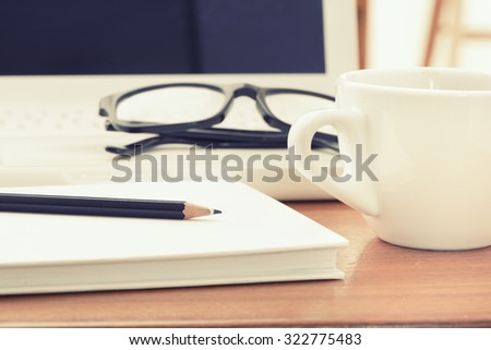 Office equipment at workplace. Desktop with laptop. Conceptual image of desk work, communication technology and business.