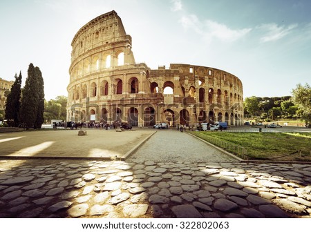 Colosseum in Rome and morning sun, Italy Royalty-Free Stock Photo #322802063