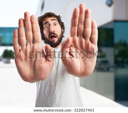 scared young man stop gesture