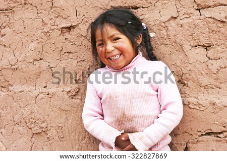 Aymara kid Royalty-Free Stock Photo #322827869