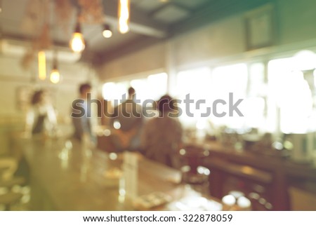 Blurred background of Coffee shop with vintage filter.