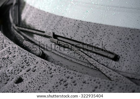 Car windshield and wiper Royalty-Free Stock Photo #322935404