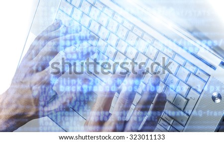 Hands coding on a laptop concept image