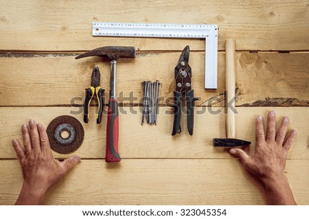 Workshop  tools on wooden background