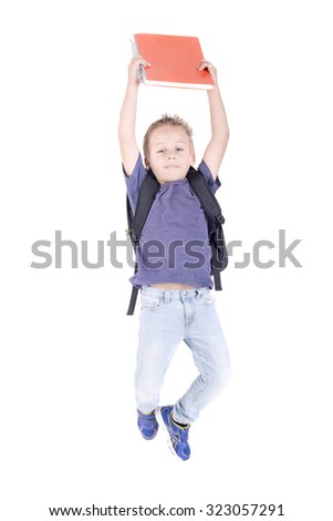 little boy isolated in white holding school books