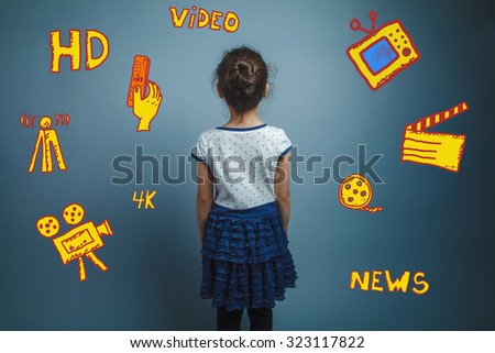 Teen girl standing with his back against the background of infographics TV channels sketch icons in the background