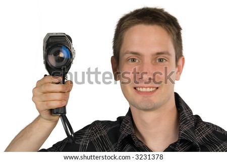 Young man with old camera posing isolated on white background