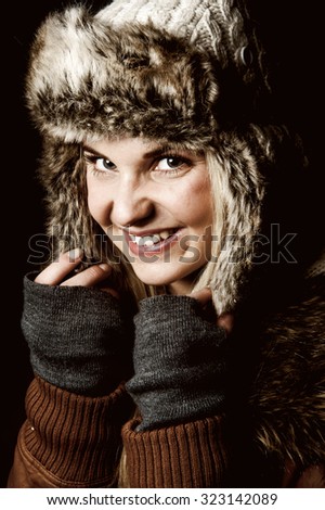 Young woman with fur hat, portrait