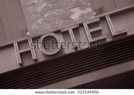 Hotel Sign on Diagonal Tilt in Black and White Sepia Tone