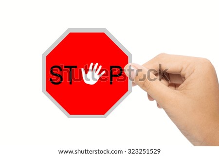 Business man holding a stop sign