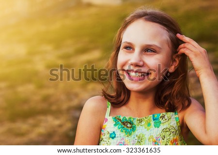 Big cheerful smile on the girl's face