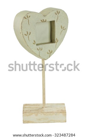 Wooden stand for a photo in the shape of heart in vintage style
