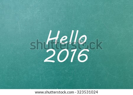 Green blackboard with hand written words note  Hello 2016