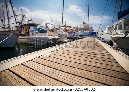 Marina with anchored boats Royalty-Free Stock Photo #323548532