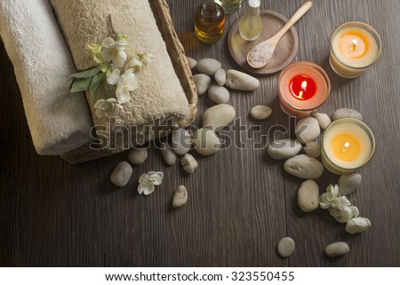 Moody spa center table top shot. Aromatherapy. Royalty-Free Stock Photo #323550455