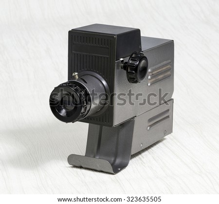 Old slide projector on a white background. Toy, Entertainment
