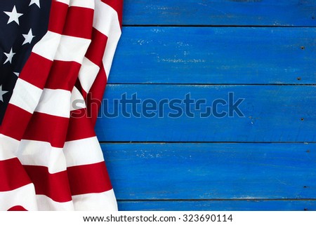 American flag on antique rustic royal blue wooden background