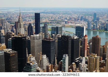 Manhattan downtown view with big skyscrapers, New York City, USA. Manhattan beautiful skyline panorama, NYC. Top of the buildings in financial district. Business background.