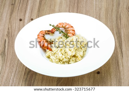 Italian trditional Risotto with tiger prawn and thyme