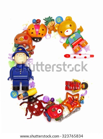 the letter C made from small toys