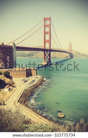 Old film retro style Golden Gate Bridge in San Francisco, vignette effect, USA.