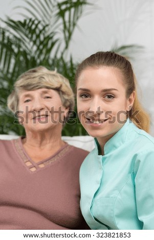 Elder lady and nurse in residential home