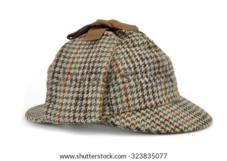 Investigation Concept With  Sherlock Holmes Hat Famous As  Deerstalker Isolated On White Background Royalty-Free Stock Photo #323835077