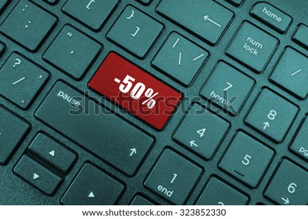 Discounting  concept, - 50 % button on computer keyboard