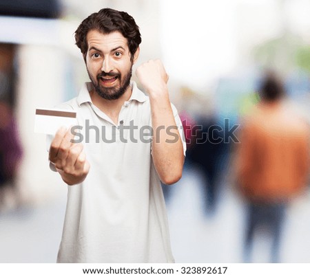 happy young man with credit card