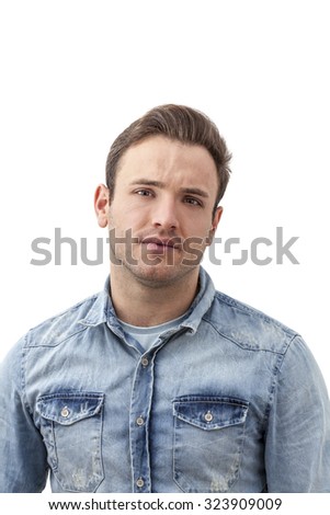 Portrait of a handsome young bearded man isolated against w hite background.