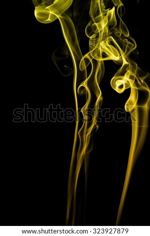 movement of gold smoke, Abstract gold smoke on black background, gold background,gold ink background,yellow smoke
