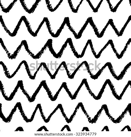 The seamless black and white zigzag pattern with brush strokes. The creative monochrome hand drawn background for your design. Textile, blog decoration, banner, poster, wrapping paper.