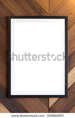 Realistic picture frames on wooden background. 