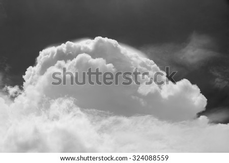 Bright sky with fluffy white clouds