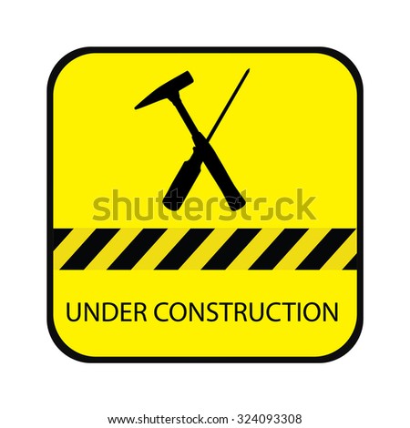 Yellow under construction road sign, with screwdriver, hammer and text under construction