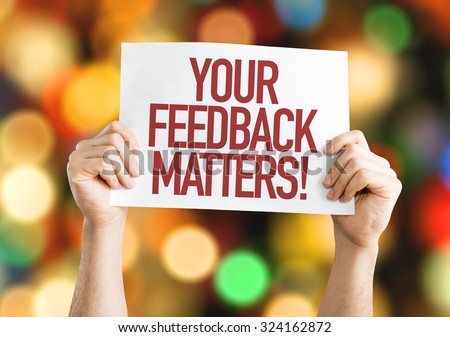 Your Feedback Matters placard with bokeh background Royalty-Free Stock Photo #324162872