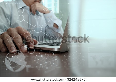businessman hand working with modern technology and digital layer effect as business strategy concept Royalty-Free Stock Photo #324245873