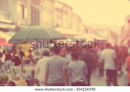 Blur people shopping in street market abstract background.Retro color style.