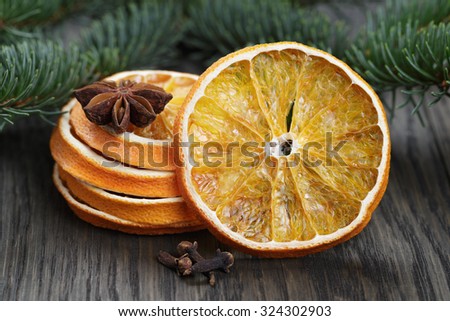 orange and anise with fir twig, photo with shallow dof