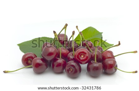 Berries red cherry with shanks are isolated on white background