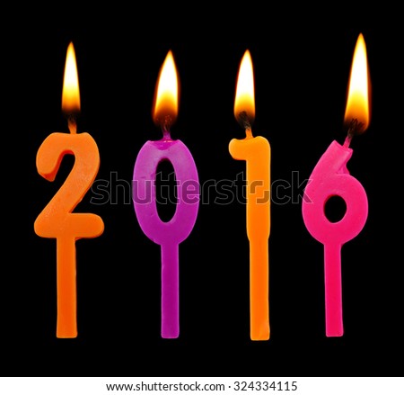 Burning candles on black background, number 2016, new year concept