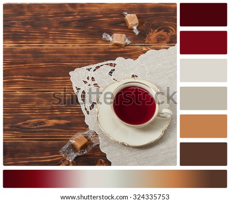 Tea Cup and Plate Of Fine Bone China. Sweets. Burnt Wooden Background. Natural Linen Napkin. Palette With Complimentary Colour Swatches.