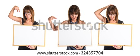Brunette woman holding an empty placard 
