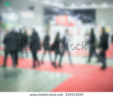 People crowd, generic background. Intentionally blurred post production.